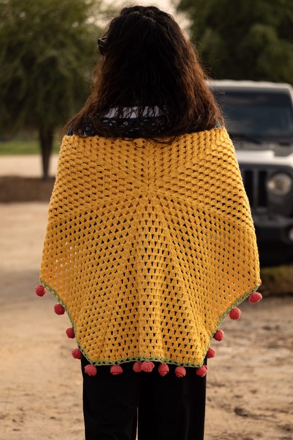 Marigold granny-stitch poncho, back view