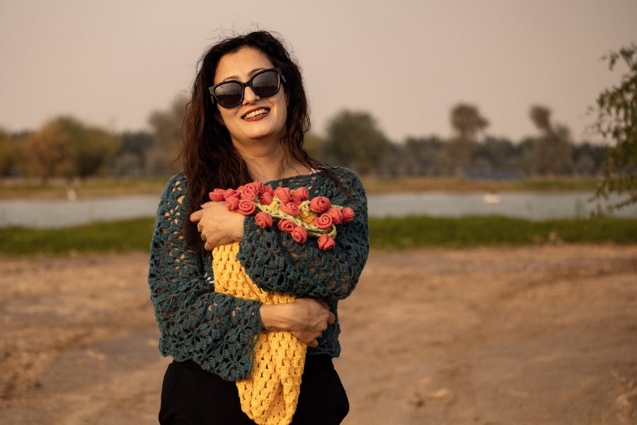 Teal crochet top with marigold shawl and rose trim